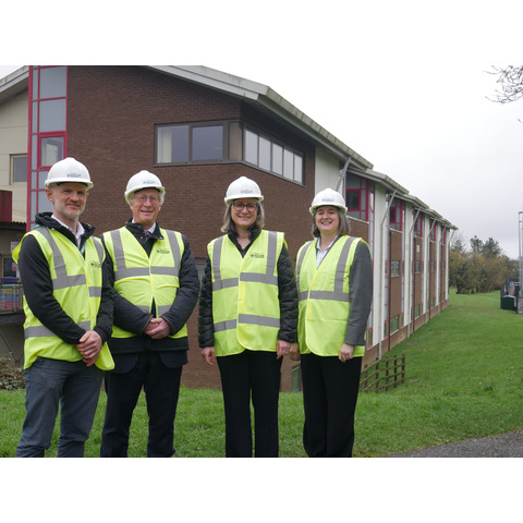 Leaders of Plymouth Marjon University outside the new Health Education building.