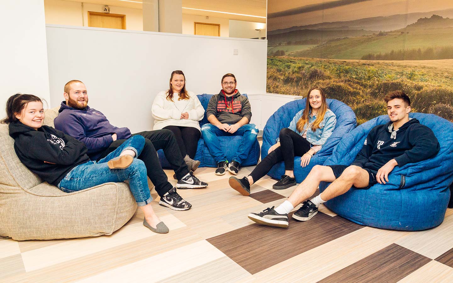 Students relax in the student hub