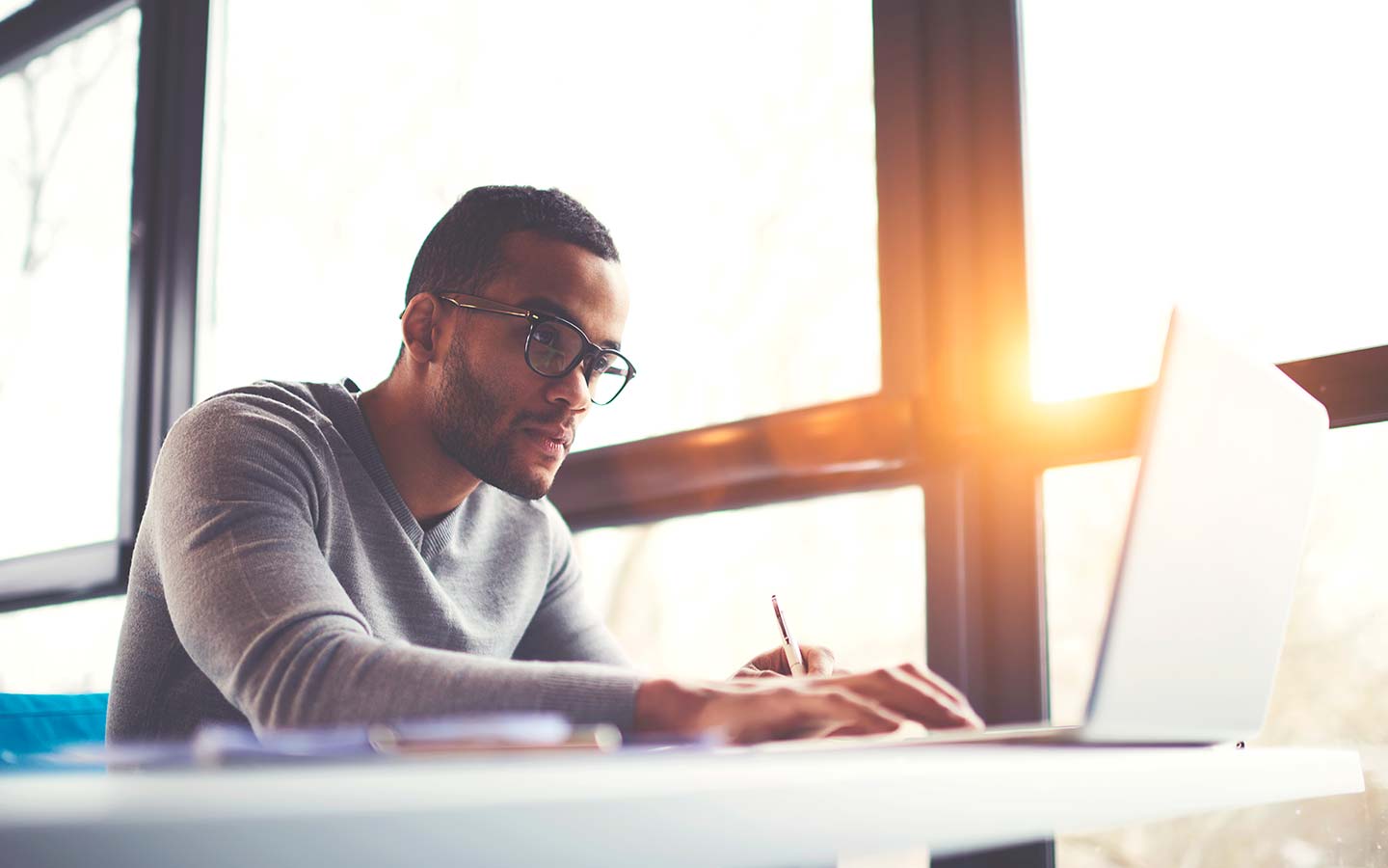 Male on a computer