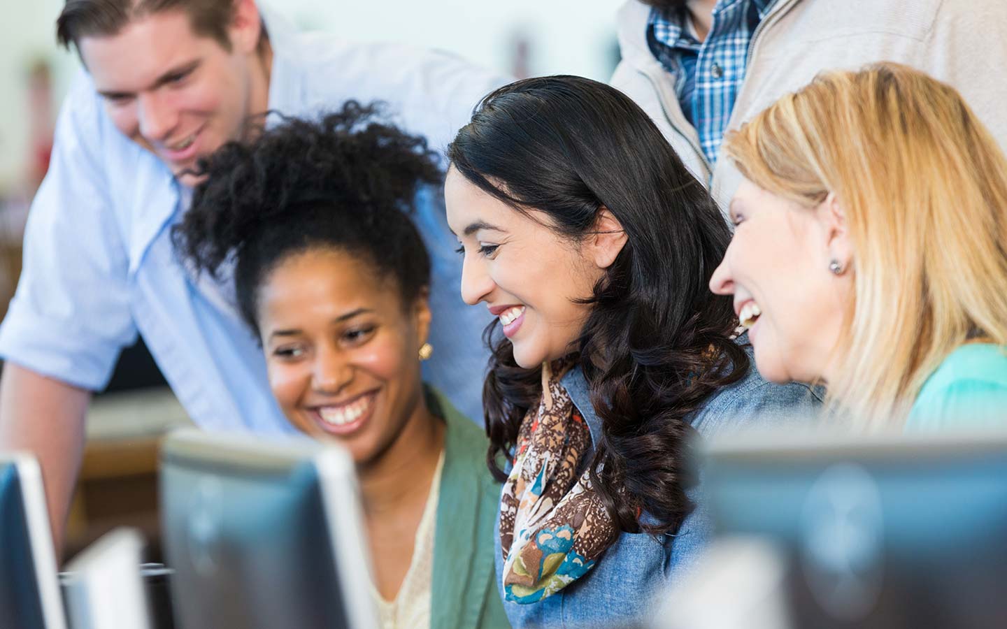 Group looking at a computer