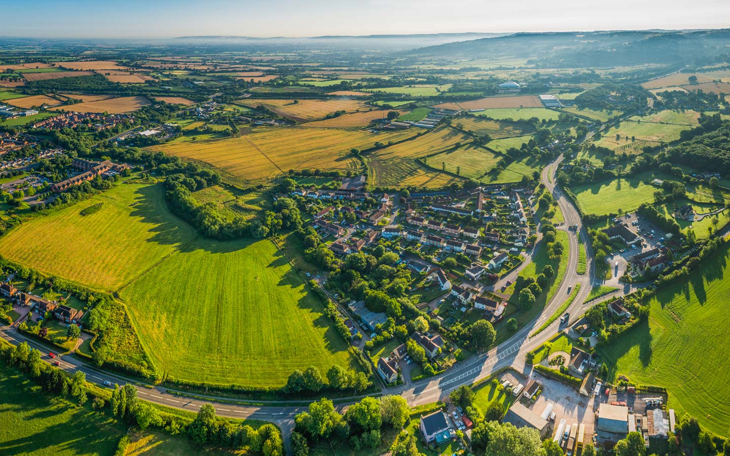 Aerial photo of a patchwork of fields in rural England