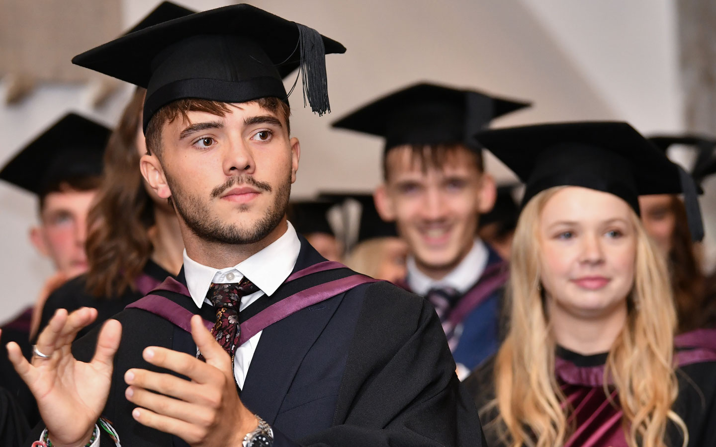Graduate at graduation ceremony