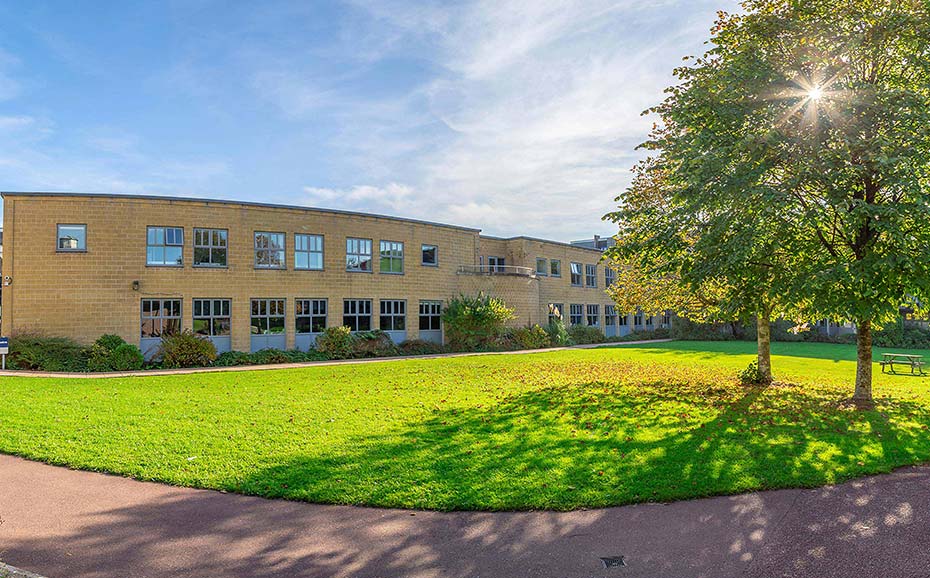 A teaching block viewed across the green quad