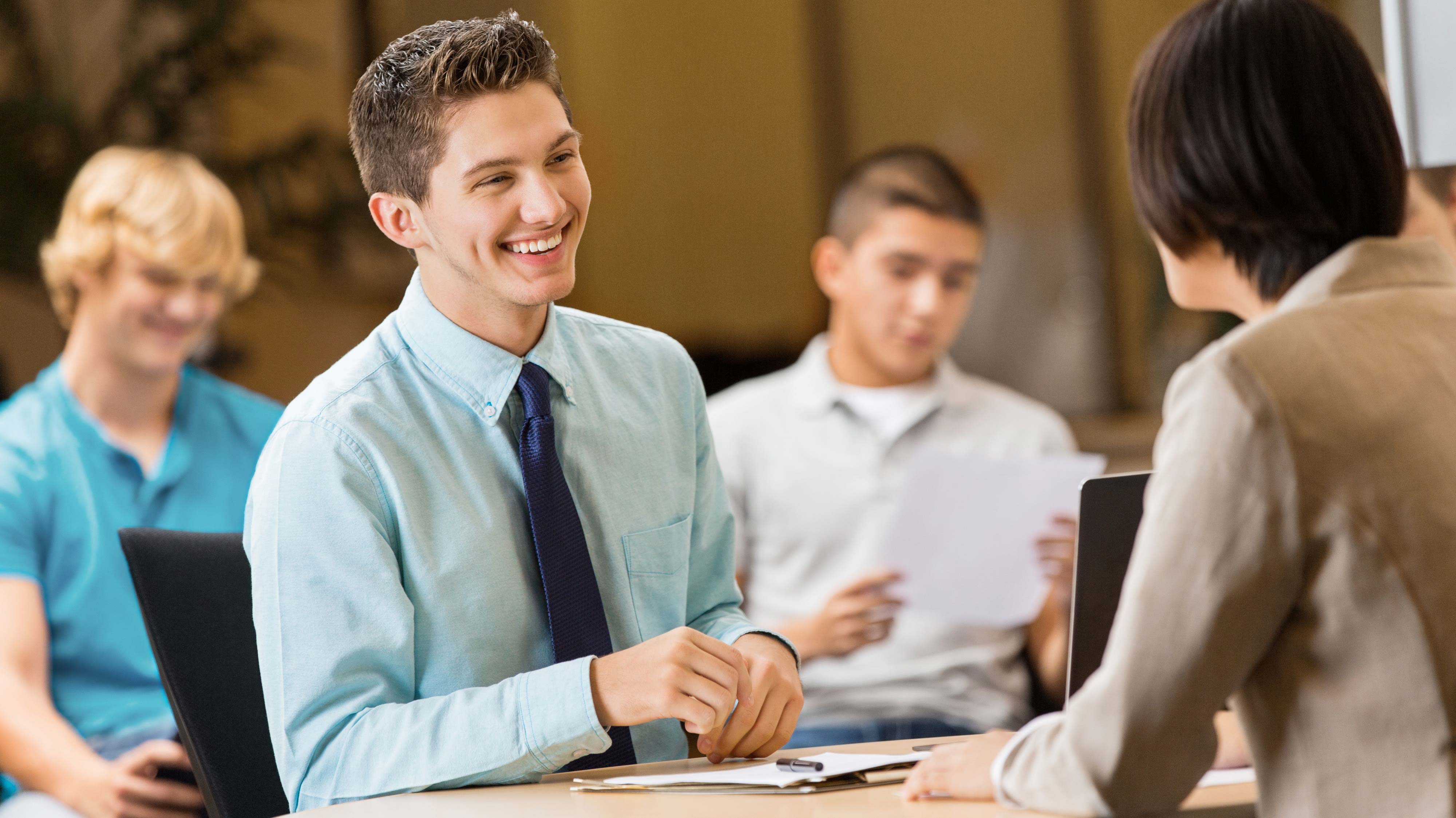 Two undergraduate students smiling directly at the camera