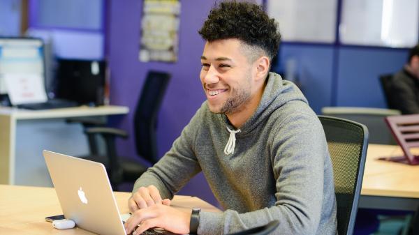Student works on laptop