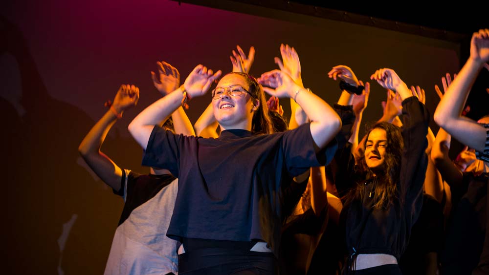 Students rehearsing a musical theatre number