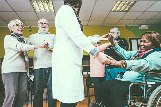 elderly people having fun in community centre