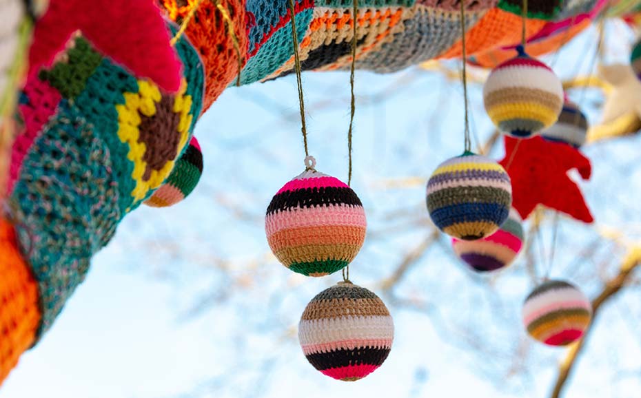 knitted art in a tree