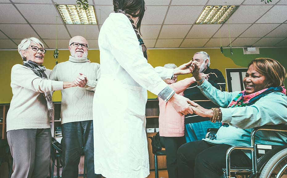 A group of elderly people enjoying dancing