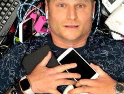 Scott Bennett surrounded by stuff