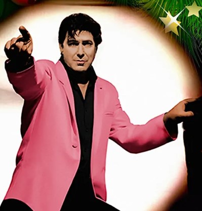 Shakin Stevens look alike points out to the crowd