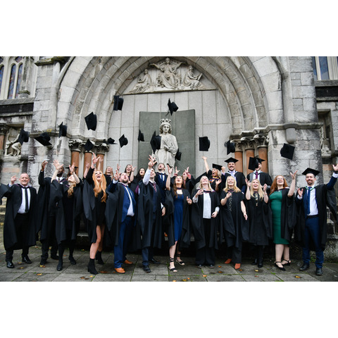 Marjon Graduates celebrating their graduation outside the Plymouth Guildhall