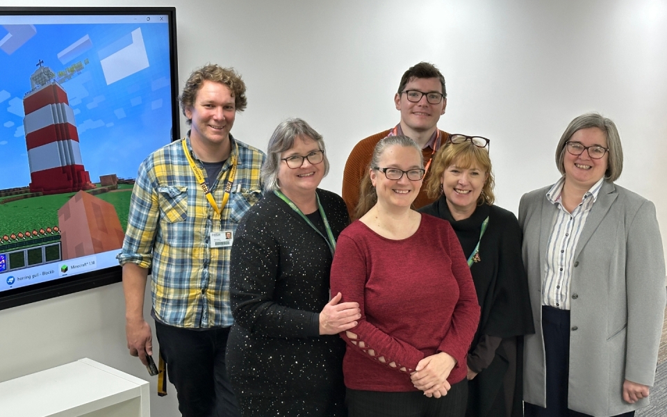 Marjon academics pose for a photo
