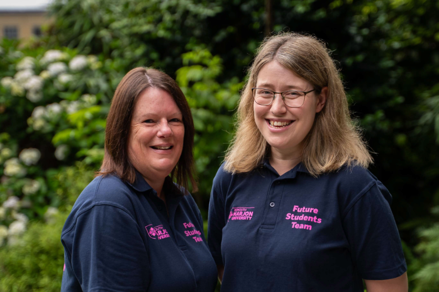 two of our female applicant support team smiling for a picture