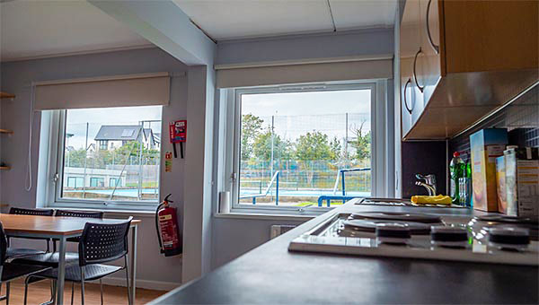 Looking across the kitchen into the dining area