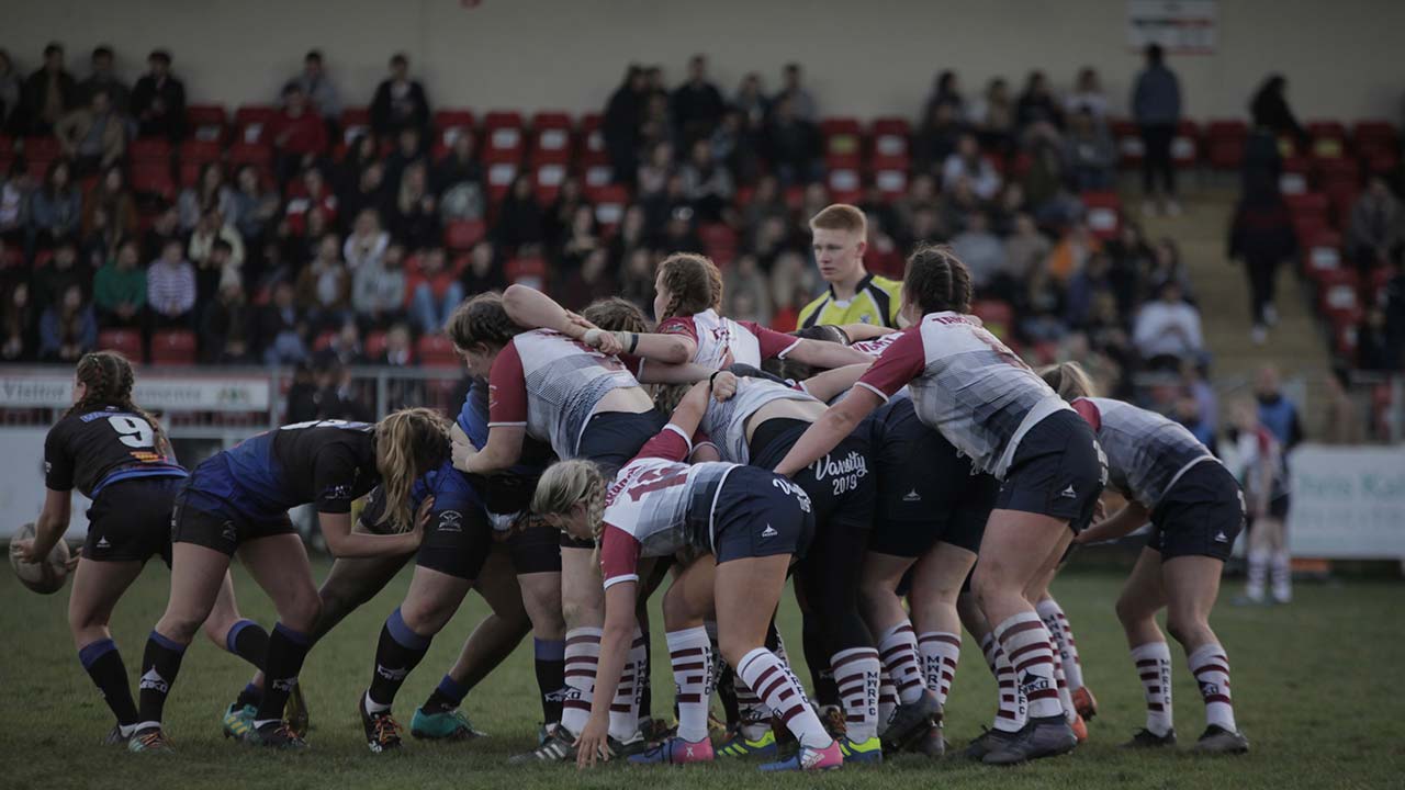 Students playing rugby