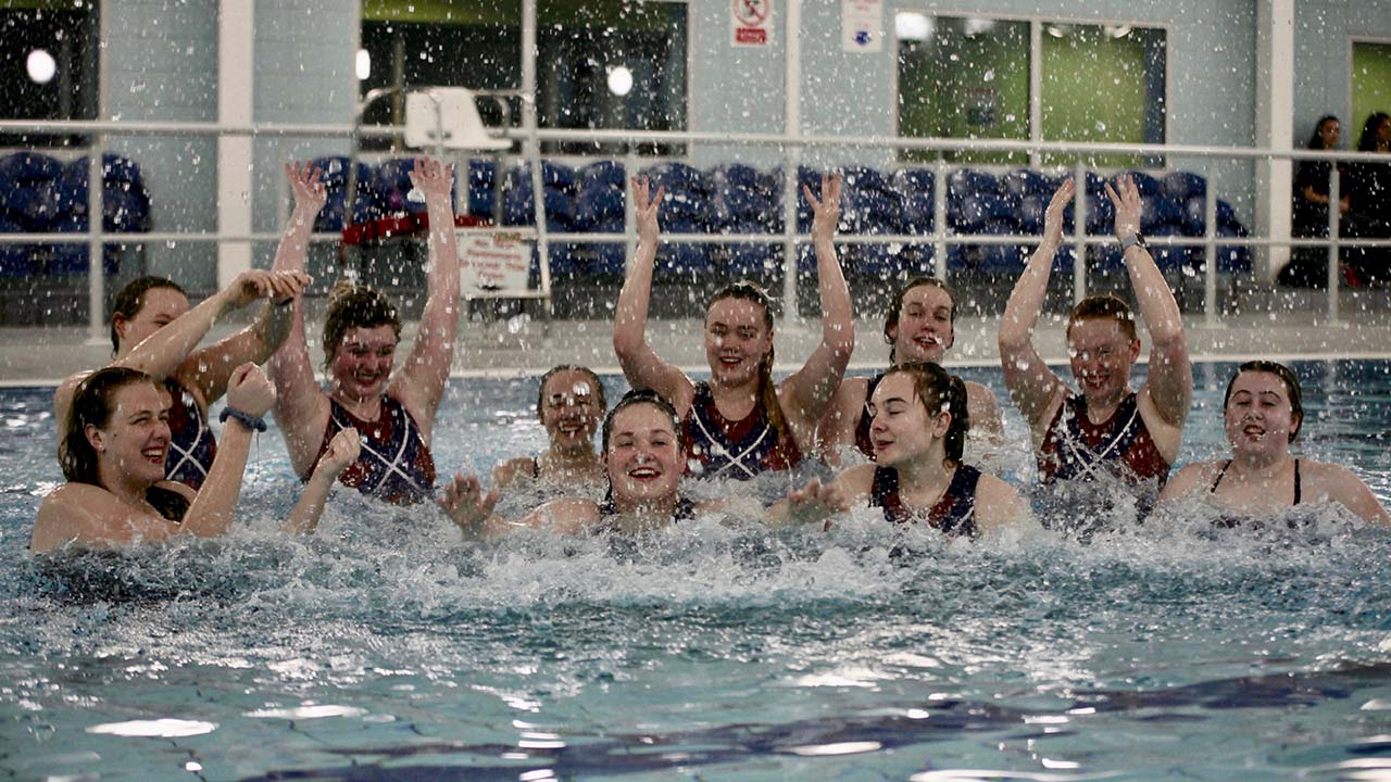 Students playing water polo