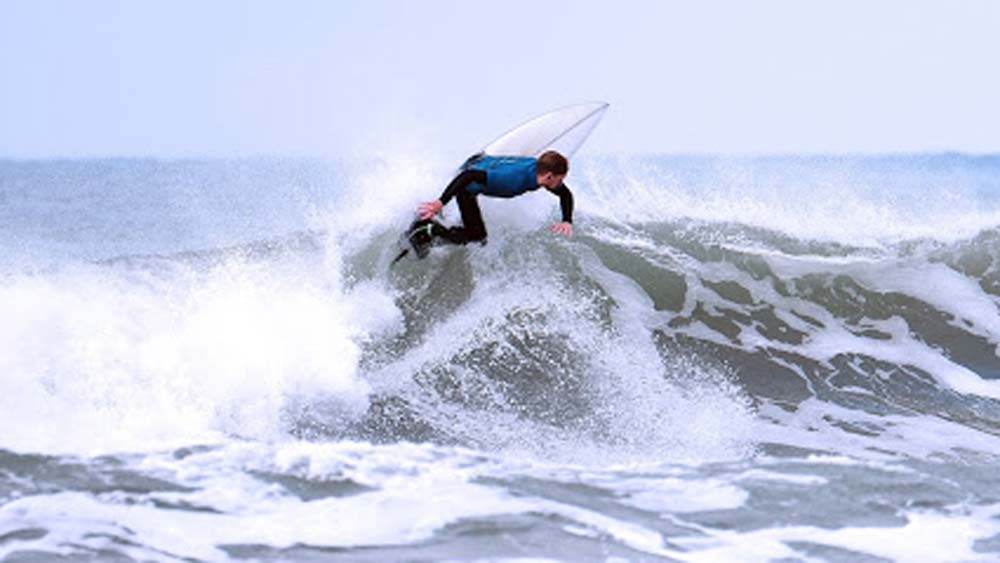 Beau Bromham surfing at a competition