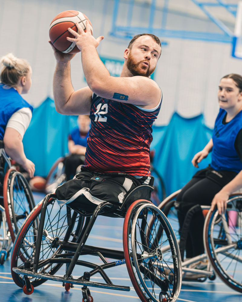 Wheelchair basketball game in sports hall at Sport & Health Centre