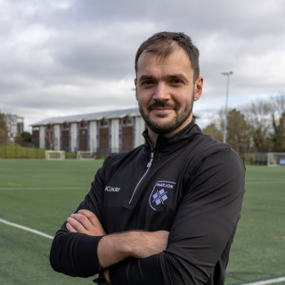Jon Tew, staff member