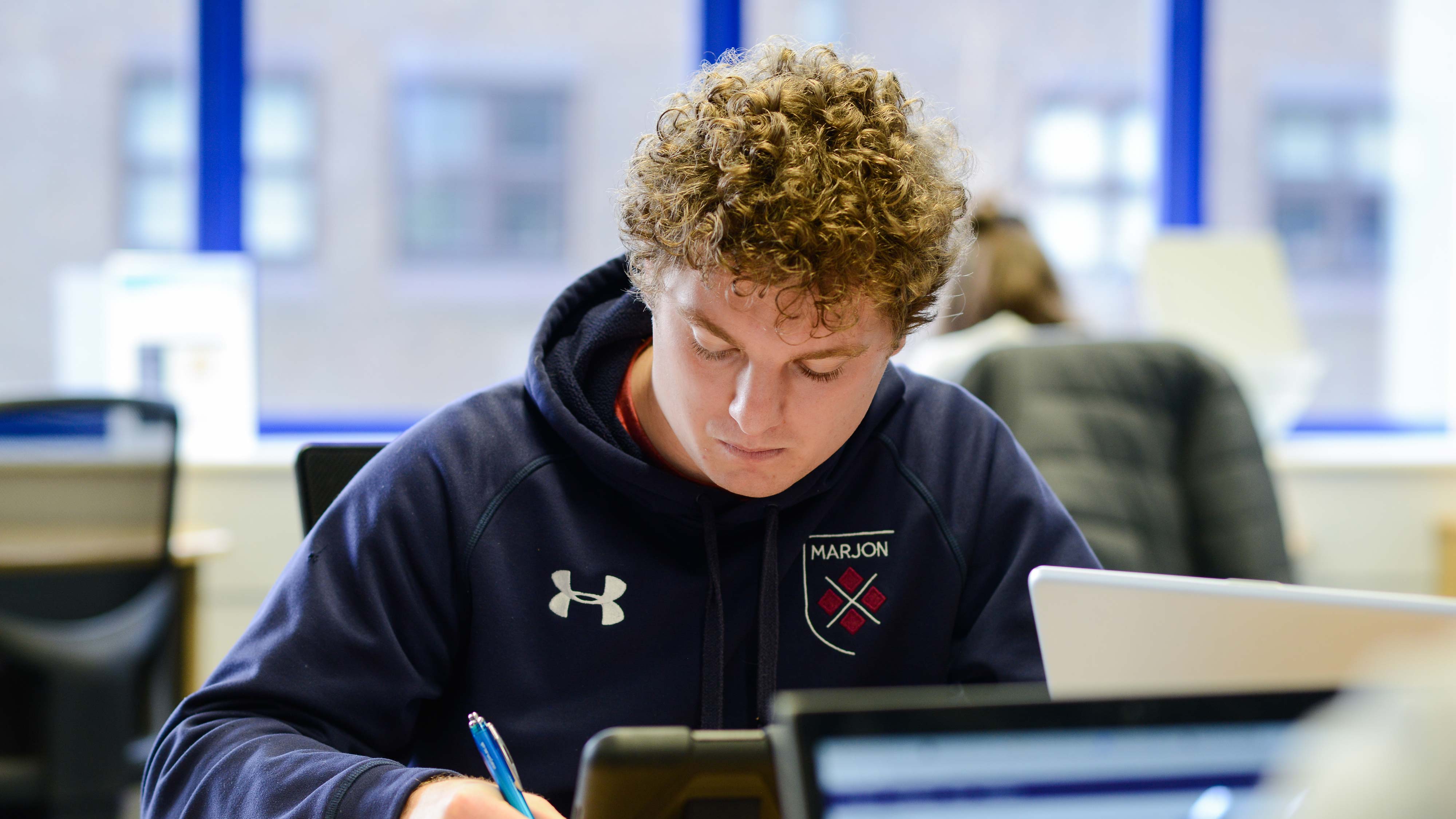 Student working in the library