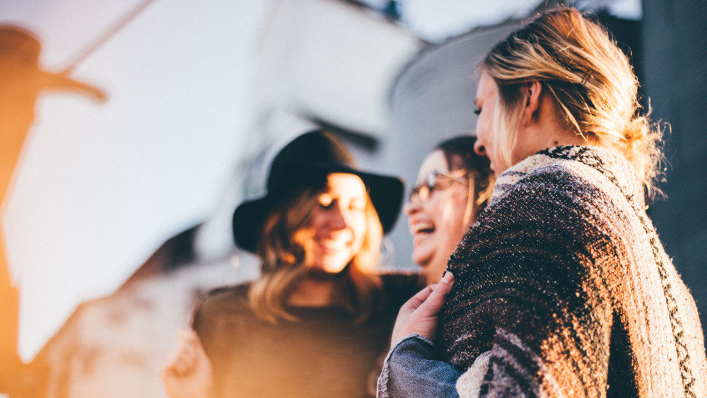 Four female students laughing