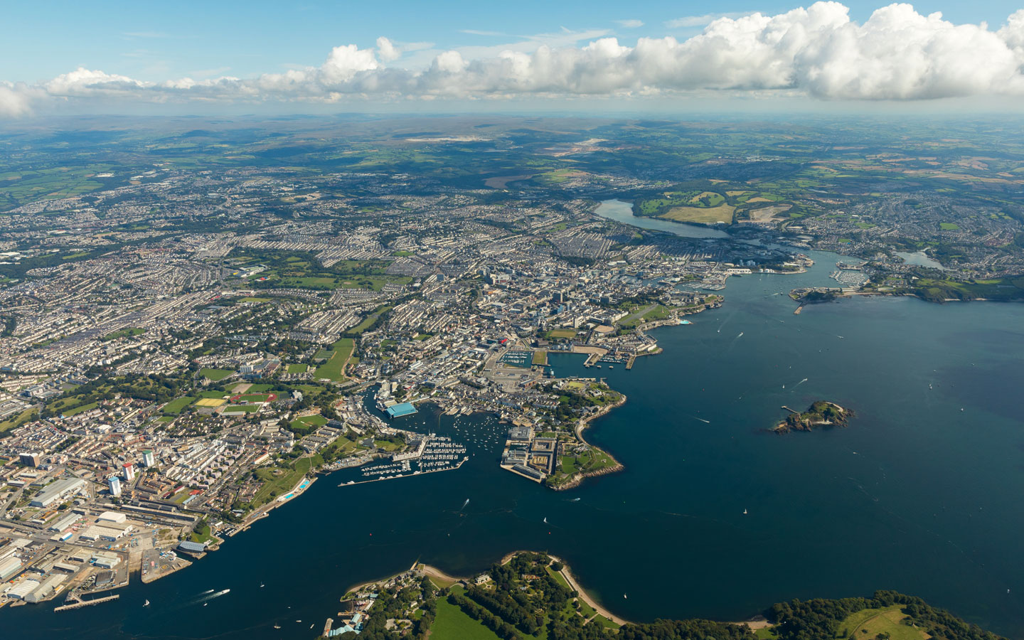 Aerial view of Plymouth city and the wider area including coast and moors