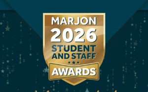 A gold crest award graphic on a teal background
