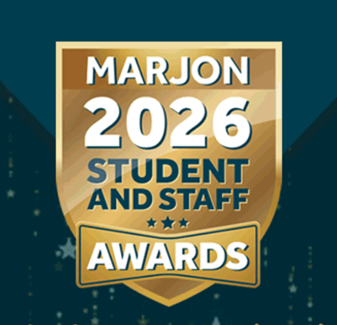 A gold crest award graphic on a teal background