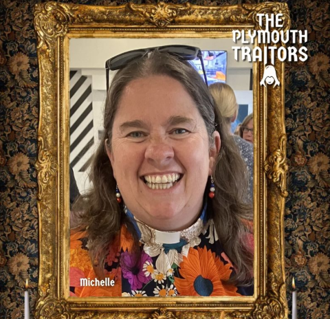 Rev Michelle Parkman headshot in ornate gold frame