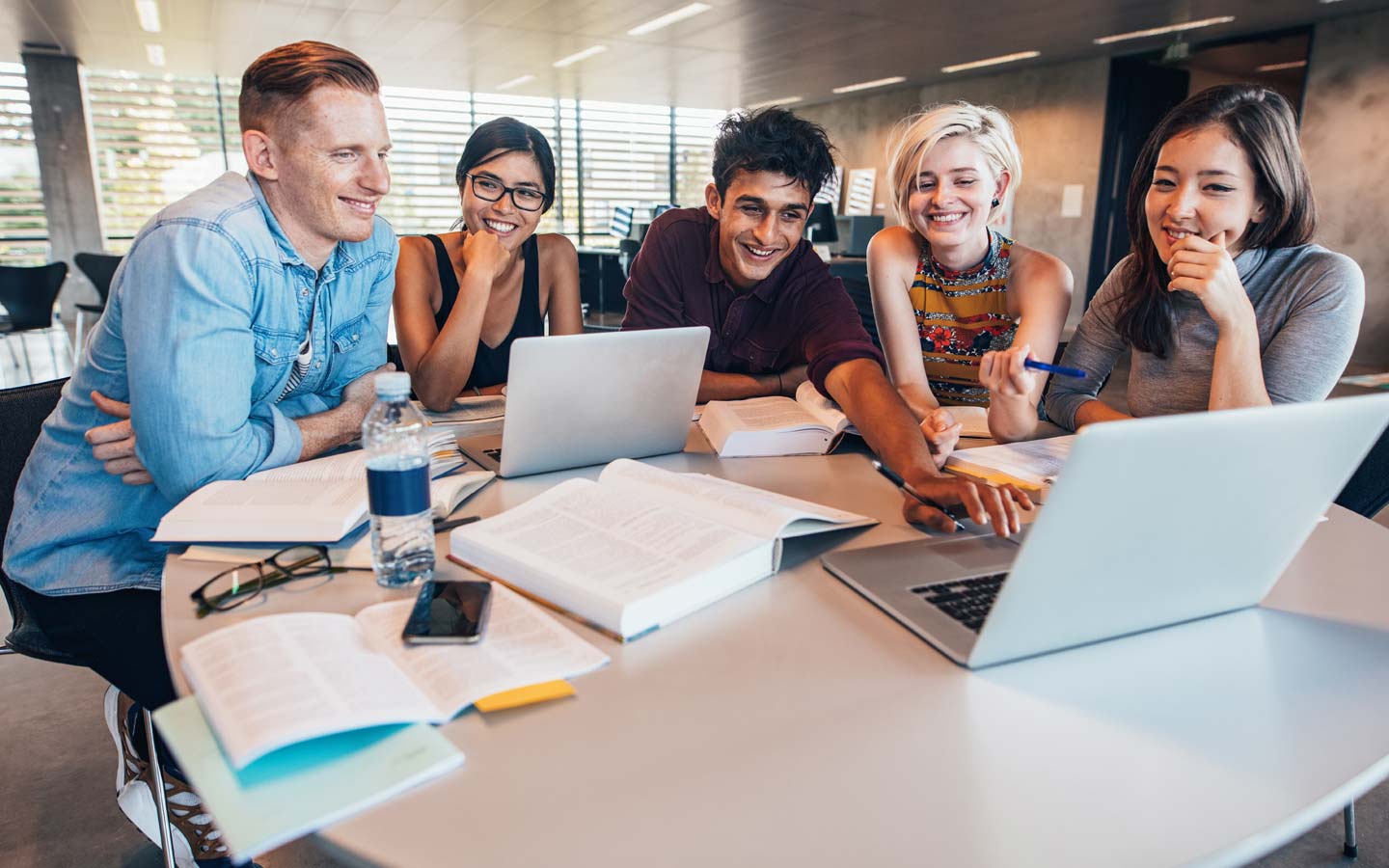 Five students together in a study group