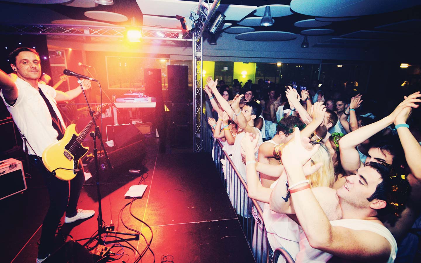 Male playing music to crowd